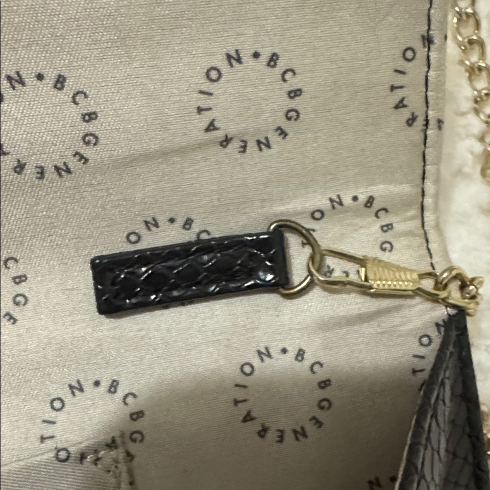 BCBG Generation Carly Crossbody Black Clutch with Gold Accents - Picture 13 of 15